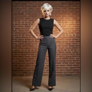 Ann Taylor Black sleeveless top with gold zipper in back